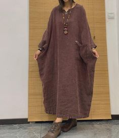 【Fabric】 Linen 【Color】 black brown, green, caramel, Coffee purple 【Size】 Shoulder width is not limited Shoulder + sleeve 57cm/ 22 " Bust 178cm / 69" Length 120cm / 46" Note: the effect of each monitor is different, there will inevitably be color difference, please pay attention to the buyer. Washing & Care instructions: -Hand wash or gently machine washable do not tumble dry -Gentle wash cycle (40oC) -If you feel like ironing (although should not be necessary) , do it with steam or while the dre Oversized Solid Color Midi Dress In Casual Style, Oversized Solid Color Casual Midi Dress, Casual Oversized Solid Color Midi Dress, Oversized Solid Color Midi Dress, Casual Tunic Midi Dress For Fall, Relaxed Fit Midi Dress For Fall, Solid Color Bohemian Dress For Fall, Fall Midi Dress With Relaxed Fit, Oversized Brown Dress For Winter