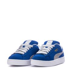 A fresh take on the classic Suede—this PUMA Suede XL youth sneaker is one for the books. Featuring an exaggerated padded collar tongue, a chunkier sole, and thick laces, this execution is inspired by the 00s but made for the modern day. A full suede upper plus a leather Formstrip makes this classic, durable, and ready for everyday looks.Features: Full suede upper with leather Formstrip. Exaggerated padded collar and tongue. Mesh insole with multiple screen-printed PUMA logo. Thick laces for a th Mid-top Sneakers For Skateboarding With Laces, Mid-top Skateboarding Sneakers With Laces, Mid-top Sneakers For Skateboarding, Sporty Lace-up Basketball Shoes With Vulcanized Sole, Blue Skate Shoes With Laces For Light Sports, Urban Low-top Basketball Shoes, Streetwear Basketball Shoes With Gum Sole, Sporty Lace-up Canvas Shoes With Gum Sole, Sporty Lace-up Skate Shoes With Rubber Sole