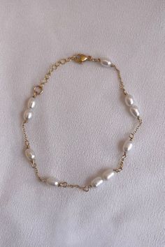 A handmade 14k Gold filled organically shaped pearl bracelet. This elegant bracelet is perfect everyday wear or special occasions and a wonderful  Gift for Mom, Wife, Friend, Sister, Grandmother and Daughter. HOW TO ORDER 1. First, select your bracelet size in the drop down box 1. Then, select your desired metal, bracelet type/set and add to cart! BRACELET MEASURING GUIDE: Average Women's Sizing: 5-6.5 inches = extra small 6.5-7 inches = small 7-8 inches = medium 8 inches+ = large *We recommend Handmade Dainty Gold Pearl Bracelet, Dainty Handmade Gold Pearl Bracelet, Gold Pearl Drop Bracelet As A Gift, Gold Pearl Bracelet With Extender, Dainty 14k Gold-filled Pearl Bracelet, Elegant Handmade 14k Gold-filled Pearl Bracelet, Elegant Handmade 14k Gold Filled Pearl Bracelet, 14k Gold-filled Bracelets With Pearl Drop, Gold Bracelets With Pearl Drop In 14k Gold Filled