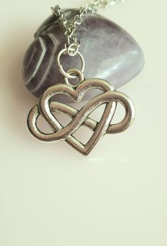 A lovely silver plated necklace with a heart and infinity symbol entwined  The necklace is 18 inches and an 1 inch extension and a lobster catch. To customise your order and make it more personal add an initial charm for £0.50 https://www.etsy.com/uk/listing/499381946/silver-initial-charm. I am happy to help with any queries of special requests, please send me a message. Silver Heart Charm Necklace For Friendship, Silver Double Heart Necklaces For Friendship, Silver Double Heart Necklace For Friendship, Heart And Infinity, Gothic Heart, Silver Initial Charms, Love Symbol, Necklace Gothic, Infinity Love