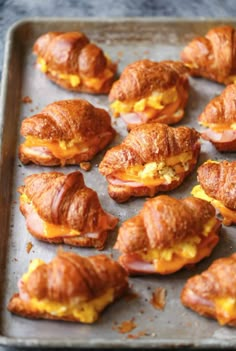 breakfast croissants on a baking sheet ready to be eaten