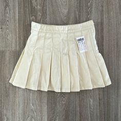 New With Tags! J. Galt Pleated Miniskirt/Skort Sz M. Approximately 14” Across The Waist And 15” Long. Has The Hidden Shorts Underneath. Ivory Color. Non-stretch Pleated Mini Skort, Pleated Miniskirt, Ivory Color, Womens Skirt, Mini Skirts, Cream, Tags, Women Shopping, Color