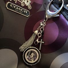 a close up of a key chain on a bag