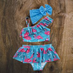 We suggest pairing this swimsuit with our Wave Pool bow! *Please note the suggested bow is not apart of the set but is available for purchase separately.* Playful Ruffled Swimwear For Summer, Cute Ruffled Swimwear For Vacation, Cute Summer Pool Swimwear, Cute Summer Tankini For Playwear, Cute Fitted Ruffle Swimwear, Playful Beach Sets With Stretch, Cute Summer Tankini For Casual Wear, Cute Fitted Ruffled Swimwear, Playful Sets For Pool And Beach Season