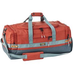 an orange and blue duffel bag with handles