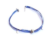 This sterling silver seashell bracelet is a great everyday summer piece for yourself or for a surf lover. A multi strand bracelet hand made with burgundy and blue waxed cord, blue glass beads and sterling silver seashell and coins. The seashell is approximately 8 mm x 6 mm. Sizes: XS ------- 5.5 - 6.1 in or 14 - 15.5 cm S ------- 5.9 - 6.5 in or 15 - 16.5 cm M ------- 6.3 - 6.9 in or 16 - 17.5 cm L ------- 6.7 - 7.3 in or 17 - 18.5 cm XL ------- 7.1 - 7.9 in or 18 - 20 cm The bracelet above is n Nickel-free Sterling Silver Bracelets For The Beach, Handmade Sterling Silver Bracelets For Beach, Handmade Sterling Silver Bracelet For Beach, Silver Multi-strand Beach Jewelry, Handmade Silver Braided Bracelets For Beach, Silver Strand Bracelets For Summer, Handmade Silver Multi-strand Wrap Bracelet, Silver Minimalist Bracelets For The Beach, Adjustable Multi-strand Sterling Silver Bracelet