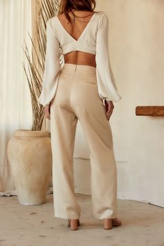 Your spring fit just got that much better thanks to the Jaxon Cream Trousers. Wear from work to happy hour, these pants are easily dressed up or down. Style with your favorite crop, our Isla Straw Fedora, a pair of strappy sandals, and you're set for the entire day! PRODUCT DESCRIPTION AND MATERIALS: - cream wide leg trousers - pleated - button closure - functional front pockets - non-functional welt back pockets - high waisted fit - finished hem - 100% lyocell - dry clean only SIZE RECOMMENDATI Cream Wide Leg Trousers, White Wide Leg Trousers, Night Out Style, 12th Tribe, Cream Trousers, Black Wide Leg Trousers, Straw Fedora, White Corset, Spring Fits