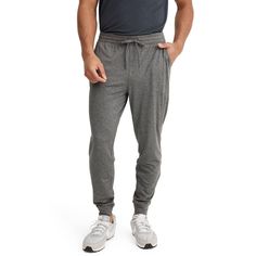 For workouts or weekends, the Jockey EVERACTIVE Knit Jogger always has you covered. Featuring ultra comfy fabric and a drawstring waistband, this pair comes equipped with sporty style and performance finishes. Stretch Sweatpants With Drawstring In Sportswear Style, Stretch Sweatpants With Drawstring, Stretch Sweatpants With Drawstring For Sportswear, Gray Sporty Activewear In Breathable Fabric, Sportswear Sweatpants With Drawstring For Gym, Casual Gray Breathable Activewear, Stretch Sportswear Joggers With Drawstring, Versatile Sweatpants With Elastic Waistband For Gym, Versatile Sports Activewear With Elastic Waistband