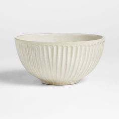 a white bowl sitting on top of a table