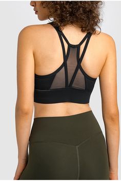 Pattern: Solid Features: Longline. mesh panel in back. removable padding. racerback Neckline: Scoop neck Product measurements: 4: length 13 in. bust 27 in. hem width 23 in6: length 13 in. bust 28 in. hem width 25 in8: length 13 in. bust 30 in. hem width 27 in10: length 14 in. bust 31 in. hem width 28 in12: length 14 in. bust 33 in. hem width 30 in Material composition: 80% nylon. 20% spandex Care: Machine wash cold. Tumble dry low. Imported Athleisure Mesh Sports Bra With Built-in Bra, Mesh Sports Bra With Built-in Bra For Light Exercise, Mesh Sports Bra With Built-in Padding For Yoga, Mesh Sports Bra With Built-in Padding For Gym, Nylon Sports Bra With Built-in Padding And Cross Back, Mesh Sports Bra With Built-in Padding For Workout, Fitted Nylon Sports Bra With Strappy Back, Strappy Back Mesh Sports Bra For Yoga, Strappy Mesh Back Sports Bra For Yoga