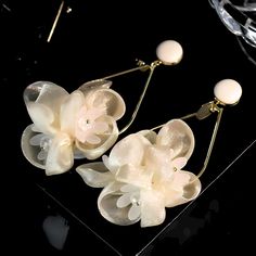 ✦ Drape yourself in the delicate sophistication of our chiffon drop earrings, showcasing a timeless flower blossom design that exudes elegance. These earrings are a perfect accessory for weddings and engagements, adding a touch of refined charm to your special day. The chiffon material creates a graceful movement, enhancing the overall allure of these classy drop earrings. Crafted for those moments of timeless beauty, let the flower blossom design symbolize the blooming love on your wedding day. Large Drop Earrings, Graceful Movement, Elegant Gothic, Crystal Hoop Earrings, Nose Rings Hoop, Blossom Design, Flower Petal, Chiffon Material, Fashion Jewelry Earrings