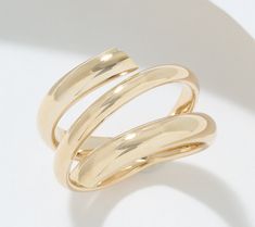 Crafted from 14K gold, this elegant, wrap-style ring is a gorgeous accent piece, ready to take your everyday ensembles to the next level. From David Markstein. Elegant Wide Band Jewelry With Ring Detail, Chic Polished Finish Formal Ring, Timeless Open Bypass Ring For Formal Occasions, Elegant Polished Stackable Open Rings, Chic Open Ring With Polished Finish, Chic Yellow Gold Ring With Polished Finish, Chic Polished Open Ring, Chic Yellow Gold Open Band Jewelry, Luxury Polished Open Bypass Ring