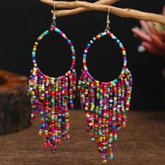 Gorgeous Boho Style Seed Bead Fringe Hoop Dangle Earrings In An Array Of Colors: Red, Pink, Purple, Blue, Green, Turquoise, Yellow, Orange, Black, Gold, White Surprisingly Lightweight! Nwt Bohemian Multicolor Hoop Earrings, Multicolor Bohemian Hoop Earrings For Beach, Bohemian Multicolor Hoop Earrings For Beach, Multicolor Wooden Beads Jewelry For Party, Summer Dangle Jewelry With Large Beads, Bohemian Multicolor Hoop Earrings With Dangling Beads, Colorful Dangle Hoop Earrings For Summer, Colorful Bohemian Hoop Jewelry, Bohemian Hoop Earrings With Dangling Beads For Party