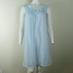 "LOVELY AND FEMININE WITH TONS OF VINTAGE CHARM Vanity Fair Vintage Chiffon Short Nightgown in Light Blue Two layers of nylon Especially Pretty Lace Made in the USA Size: Small 36\" length (shoulder to hem) 38\" bust (19\" seam to seam) Wonderful Vintage Condition item#0225/098897" Blue Sheer Sleep Dresses, Sheer Blue Sleep Dresses, Light Blue Sleeveless Sleep Dress, Blue Sheer Sleeveless Nightgown, Vintage Blue Sheer Sleepwear, Blue Sheer Vintage Sleepwear, Sheer Sleeveless Nightgown For Sleep, Sheer Light Blue Summer Sleepwear, Light Blue Sheer Dress For Daywear