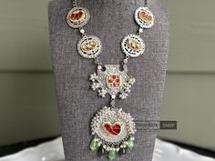 German silver navratri necklace set ,desi necklace , indian jewelery,statement necklace,Bollywood necklace,indian jewellery OCCASION: PARTY WEAR, WEDDING, MARRIAGES, CASUAL, DAILY WEAR These Earrings set have an excellent finish Ideal Gift Idea: Perfect beautiful & memorable gift for you and your loving wife, girlfriend, sister, aunt, daughter, and mom/mother/mummy. CARE Avoid Contact With Chemicals Such As Perfumes Or Any Sprays. Avoid Contact With Water. Use Butter Paper Or Cotton Cloth To Sto Bollywood Style Metal Kundan Necklace For Celebrations, Metal Necklaces For Wedding And Diwali, Diwali Wedding Metal Necklaces, Bollywood Style Metal Jewelry Sets For Festivals, Festive Kundan Necklace For Celebration, Silver Kundan Temple Necklace With Meenakari, Bollywood Style Metal Kundan Necklace For Diwali, Silver Meenakari Kundan Temple Necklace, Bollywood Festival Metal Jewelry