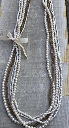 Good condition, unique piece - please see measurements in the pics. Thank you for looking! Party Pearl Multi-strand Beaded Necklace, Elegant Multi-strand Beige Necklace, Elegant Beige Multi-strand Necklace, Pearl White Multi-strand Beaded Necklace, Pearl Multi-strand Costume Jewelry Necklace, Pearl White Beaded Multi-strand Necklace, Beaded Multi-strand Pearl Layered Necklace, Multi-strand Pearl Necklace For Party, Costume Multi-strand Pearl Necklace For Party