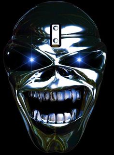 an alien head with glowing eyes and teeth is shown in front of a black background