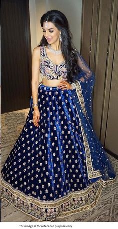 Bollywood Replica LehengaLehenga in Royal Blue Colour Velvet with Multi and Coding Embroidery Work with Inner in Silk and Flairs 2.75 Mtr with Length 44” appr as Semi Stitched.Blouse 1 Mtr Blue Colour Heavy Velvet with Multi and Coding Embroidery Work and Dupatta in 2.25 Mtrs Blue Colour Net with Embroidery Work. Semi stitch material.Shipping time 5-7 daysBuy this Saree at Kollybollyethnics and make your occasion very special !!. With Express Free Shipping and Custom Stitching, Shop Bollywood Mo Blue Colour Lehenga, Velvet Wedding Lehenga, Blue Velvet Lehenga, Blue Velvet Wedding, Blue Work Blouse, Royal Blue Lehenga, Velvet Lehenga, Cotton Lehenga, Velvet Wedding