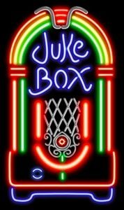 the juke box neon sign is lit up in blue, green and red colors