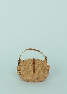 Sans Arcidet's Sam Mini Bag is crafted of natural crocheted raffia and features a tab closure, exterior pockets and a detachable faux leather shoulder strap. Measures approximately 7" x 3" x 6". Color tea. 100% raffia. Lining 100% cotton. Handle 88% polyurethane, 8% polyester, 2% cotton, 2% leather. Made in Madagascar. Everyday Straw Shoulder Bag With Detachable Handle, Natural Straw Satchel With Removable Pouch, Natural Straw Satchel Bag With Removable Pouch, Natural Satchel With Top Handle And Detachable Strap, Natural Crochet Shoulder Bag With Removable Pouch, Natural Crochet Crossbody Bag For Spring, Natural Straw Shoulder Bag With Detachable Strap, Natural Satchel Shoulder Bag With Detachable Strap, Beige Crochet Top Handle Bag With Woven Leather