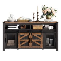 an entertainment center with wooden doors and drawers