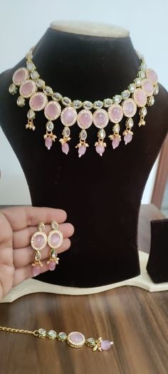 *Beautiful Premium Quality Kundan Choker With Monalisa Stone *Combination Of Kundans *Comes With Matching Earrings *Front Side is Monalisa Stone With Kundan *Pearls And Kundan Are Of Original Quality *For More Beautiful Collection, Check At https://www.etsy.com/shop/placeoffashion *Necklace Fitting Is Adjustable *Earring Closure: Push Back **Necklace Closure : Beautiful Silk Thread *It is a Bridal or Partywear Set. *It Will Give You a Unique and Beautiful Look  *You Can Wear This Beautiful Set A Handmade Pink Kundan Necklace For Wedding, Elegant Pink Kundan Necklace Gift, Pink Choker Necklace For Party, Elegant Pink Choker As Gift, Elegant Handmade Pink Choker, Elegant Pink Choker For Gift, Handmade Pink Bridal Necklace, Handmade Pink Kundan Necklace For Gift, Adjustable Pink Jewelry Set For Party