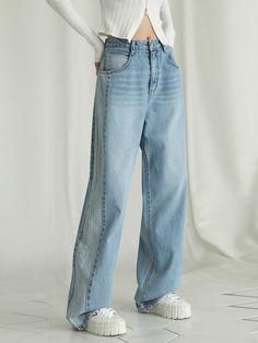 Editor's NotesCut from 100%cotton denim fabric, these jeans feature a wide silhouette in long length. Theyhave two-toned color details on the sideline. Recommend creating various styling by matching them with top clothes.     - Wide-fit denimpants- Two-toned color details - Double closureof button and zipper- Front and backpocket details Measurements (in.)Size (XS / S / M / L / XL)- Length: 43.3 in. / 44.09 in. / 44.48 in. / 45.27 in. / 45.86 in.- Waist: 13.78 in. / 14.56 in. / 15.15 in. / 16.53 in. / 17.71 in.- Hip: 19.29 in. / 20.07 in. / 20.86 in. / 21.65 in. / 22.63 in.- Rise: 12.2 in. /  12.99 in. / 13.38 in. / 13.77 in. / 14.17 in.- Thigh: 11 in. /  11.8 in. / 12.4 in. / 12.79 in. / 13.38 in.- Hem: 8.66 in /  9.25 in. / 9.64 in. / 10.23 in Blue Mid-rise Flare Jeans With Contrast Stitching, Mid-rise Blue Flare Jeans With Contrast Stitching, High Rise Blue Flare Jeans With Contrast Stitching, Wide Leg Denim Flare Jeans With Contrast Stitching, Wide Leg Flare Jeans With Contrast Stitching, Medium Wash Wide Leg Bottoms With Contrast Stitching, Wide Leg Bottoms With Contrast Stitching In Medium Wash, Medium Wash Wide-leg Bottoms With Contrast Stitching, Blue Wide Leg Jeans With Contrast Stitching