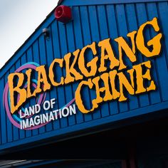 the sign on the side of a building that says backigang chine land of magnification