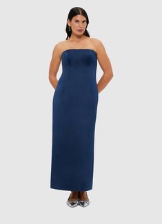 PRODUCT DESCRIPTION Premium textured maxi dressStrapless necklineInvisible side zip closureFitted waistFully lined SIZE & FIT 6 8 10 12 14 16 18 Bust 80 85 90 95 101 107 113 Waist 65 70 75 80 86 92 98 Hip 94 99 104 109 115 121 127 Back length 116 117 118 119 120 120 120 Hem Circumference 87 92 97 102 108 114 120 Amanda is 5’9" (177 cm) and wears a size 8Bust: 31” (82cm) / Waist: 24" (61cm) / Hips: 35” (89cm) Pala is 5’10” (178 cm) and wears a size 12Bust: 39” (99cm) / Waist: 31” (78cm) / Hips: 4 Blue Fitted Viscose Maxi Dress, Sequin Maxi Dress Navy, Blue A-line Non-stretch Maxi Dress, Luxury Blue Viscose Maxi Dress, Elegant Navy V-neck Maxi Dress, Tara Milk Tea, Maxi Dress Navy, Denim And Lace, New Arrival Dress