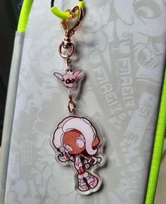 a keychain with a cartoon character on it