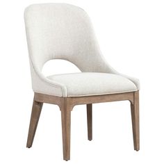 an upholstered chair with wooden legs and a white fabric seat pad on the back