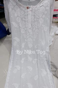 Nibs Tog White Chikankari Kurta Palazzo Set for Women with FREE Matching Inner, Premium Viscose Georgette Chikankari Kurti A premium Chikankari Kurta for any ethnic look, available in multiple colours. Pair up with palazzo or pant for full ethnic look. Shop More Chikankari outfits by Nibs Tog on our Shop : https://www.etsy.com/in-en/shop/NibsTog Features: Fabric: The beautiful Chikankari Kurta is made of Pure Viscose Georgette Fabric.  The Kurti is comfortable to wear. The inner is made of Cotton fabric. Chikankari Pant is made of pure cotton fabric & comfortable to wear. Chikankari Palazzo is made of Viscose Georgette fabric with attached cotton linning. Style: The Chikankari Kurta is made in straight style with beautiful hand embroidery around the neck.  It has motifs embroidered on rest White Churidar With Floral Embroidery For Transitional Season, White Salwar Kameez With Floral Embroidery For Transitional Seasons, Transitional White Salwar Kameez With Floral Embroidery, Unstitched Cutwork Traditional Wear For Diwali, White Cutwork Dupatta For Designer Wear, Bollywood Style Traditional Wear With Cutwork For Eid, Wedding Straight Kurta With Cutwork, Wedding Traditional Wear Straight Kurta With Cutwork, Wedding Dupatta With Cutwork For Festivals