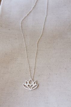 An original Lola&Cash protea necklace featuring a hidden heart -- d e t a i l s -- -protea measures 2cm wide -hand sawn out of solid sterling silver -completed in a mirror finish -includes a 45cm chain This pendant is also available in gold as seen in last picture https://www.etsy.com/listing/621948340/gold-protea-pendant-solid-9ct-yellow?ref=shop_home_active_1 -All Lola&Cash jewellery will arrive gift wrapped ---------------------------------------- Please Note - Made to order - Rush or Dainty Flower Pendant Jewelry For Meditation, Elegant Lotus Flower Jewelry Gift, Delicate Silver Necklace For Meditation, Spiritual Lotus Flower Necklaces For Gifts, Spiritual Lotus Flower Necklace Gift, Delicate Small Jewelry Gift, Delicate Jewelry For Gifts, Small Minimalist Necklace As A Gift, Delicate Silver Charm Necklaces For Bridesmaids