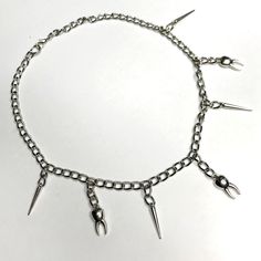 "💌JOIN OUR EMAIL LIST FOR 20% OFF COUPON💌 Sign up here: http://eepurl.com/hVBecv (You will receive exclusive deals, information on upcoming releases/giveaways and much more! Check spam folder if you cannot find email containing instant coupon code.) If you're wondering what you're lacking to your fit, it's this teeth chain obviously. 😏 This chain comes with 7 charms total that are cute little teeth and spikes. Want more or less? Just message me and let me know. Additional will cost extra. The Diy Alternative Clothes, Jewellery Chain, Clothes Grunge, Dope Clothes, Alternative Jewelry, Grunge Look, Gothic Aesthetic, Cool Necklaces, Necklace Choker