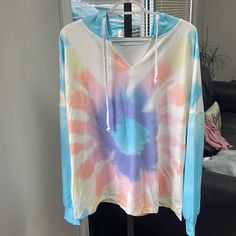 Tie-Dye Blue Long Sleeve Hoodie For Summer, Tie-dye Tops With Drawstring Hood For Spring, Tie Dye Hooded Top For Spring, Tie Dye Top With Drawstring Hood For Spring, Spring Tie Dye Top With Drawstring Hood, Acid Wash Hooded Top For Spring, Blue Summer Hoodie With Drawstring Hood, Multicolor Hoodie For Spring, Spring Multicolor Hoodie Top