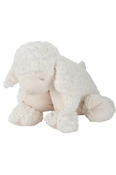 a white stuffed animal that is laying down