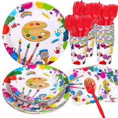 colorful paint splattered paper plates and cups with red utensils on them