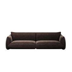 a brown couch sitting on top of a white wall