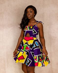 Dress in style in this African print dress, perfect  for everyday wear.   This item is completely handmade, so you are welcome to customise it to your taste, you even get to choose a print of your choice and we can add or remove whatever you wish. Please feel free to message us for any customisation  Product details: Made with high quality prints that will last a lifetime. Handmade with 100% cotton Pockets included Care instructions: Wash with mild detergent. Do not bleach Patterned Printed A-line Dress, Multicolor A-line Sundress, Colorful Patterned Sundress, A-line Beach Dress With Vibrant Print, Fitted Sundress In Multicolor Print, Fitted Multicolor Print Sundress, Multicolor Batik Print Dress For Party, Multicolor Batik Print Party Dress, Multicolor Cotton A-line Midi Dress