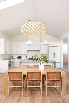 Styled Woven Leather Strap Dining Chair in a white kitchen. - Saffron and Poe Kitchen Neutral, Kitchen Dining Room Combo, Frame Kitchen, Ceiling Kitchen, Scandinavian Dining Room, Interior Design Contemporary, Kitchen Contemporary, Leather Counter Stools, Leather Dining Chair