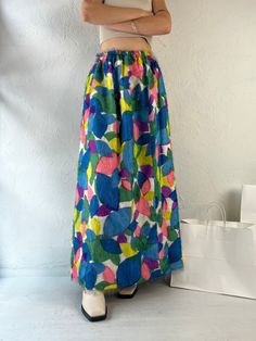 "- Vintage 1970s handmade rainbow skirt - Feathery material - Elastic at the waist - XS Waist: 22\" - 27\" Length: 41\"" Multicolor High Waist Maxi Skirt, High Waist Multicolor Maxi Skirt, High Waist Multicolor Skirt For Spring, Vintage Multicolor Maxi Skirt For Spring, High Waist Multicolor Lined Skirt, Multicolor High Waist Skirt For Beach, Bohemian High Waist Multicolor Skirt, Bohemian High-waist Multicolor Skirt, High Waist Multicolor Beach Skirt