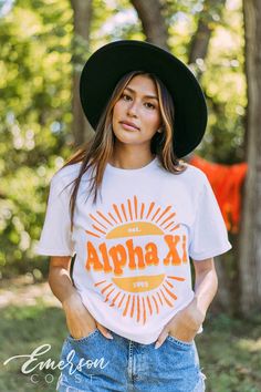 Looking for a trendy sorority tshirt that'll last? 🫶🏻 This Alpha Xi Delta Sunshine Tee is the answer! Whether you're giving this tee as a gift or treating yourself with something new, you'll be obsessed with this sorority t-shirt! 🌊 YOU'LL LOVE THIS STYLE 🌊 Meet the Alpha Xi Delta Sunshine Tee - the perfect t-shirt for sorority girls! Our basic tee is a classic style that looks great on everyone. The soft, breathable fabric makes it comfortable to wear all day long, and the bright white colo Game Day Summer T-shirt With Screen Print, Summer Game Day T-shirt With Screen Print, Summer Game Day T-shirt Crew Neck, Sorority Cotton T-shirt For Spring, Sorority Style Cotton T-shirt For Spring, Spring Sorority Cotton T-shirt, Graphic Tee For Game Day In Spring, Spring Game Day T-shirt With Screen Print, School Spirit T-shirt For Game Day In Spring