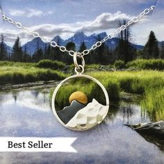 "This nature inspired mountain necklace will remind you of your favorite place. Layers of sterling silver with a bronze sun peeking out. This necklace is the perfect gift for the woman who loves nature, whether she skis, hikes, camps, or just enjoys the mountain view. LISTING IS FOR: - 1 sterling silver mountain range with bronze sun charm necklace. --------------------------------------------------------------------- FEATURES: - 1/2\" wide mountain range charm. - On 16\" long sterling silver chain. --------------------------------------------------------------------- PERFECT FOR: Best friend birthday gift, hiker or camper gift, girlfriend travel keepsake --------------------------------------------------------------------- Mini mountain necklace: https://www.etsy.com/listing/1332928219/mi Silver Husky, Lunar Jewelry, Gold Mountain, Sun And Moon Necklace, Moon Necklace Silver, Wanderlust Jewelry, Mountain Jewelry, Mountain Necklace, Travel Keepsakes