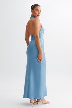 Unmatched beauty.The BELLADONNA Satin Halter Maxi Dress is an exquisite choice for elegant evenings and special occasions. This dress features a chic halter neckline with a front bust cutout that adds a touch of allure. The straight skirt flows gracefully to the floor, complementing the open back design for a striking silhouette. Fully lined for comfort, the dress also includes a centre back invisible zip for a seamless finish. With its sophisticated style and luxurious satin fabric, the Bellado Backless Fitted Bridesmaid Dress For Prom Season, Halter Neck Dress With Fitted Bodice For Prom Season, Glamorous Halter Neck Evening Dress With Fitted Bodice, Formal Halter Neck Evening Dress With Ruched Bodice, Glamorous Halter Neck Evening Dress With Sweep Train, Glamorous Halter Dress With Back Opening For Prom, Backless Bridesmaid Dress With Fitted Bodice For Prom, Glamorous Evening Dress With Fitted Bodice And Halter Neck, Halter Neck Evening Dress With Keyhole Back For Gala