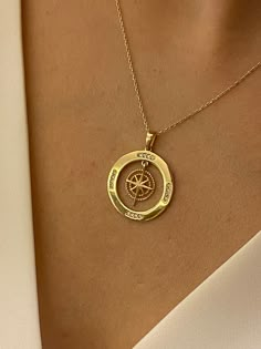 "ABOUT PRODUCT This 14K solid gold Compass with Zirconia Stones necklace is beautifully designed and hand crafted with our associates to make this a special gift for your loved ones. Knowing the value of our customers, We prepare each piece with extra care and attention. ITEM DETAILS Material: 14K Gold Approx: 2.70 gram Available colors: Gold, Rose Gold, White Gold Available Sizes: 14\" to 20\" ✪ 14k Solid Gold ( Certification will be included with your order ) ✪Available 14K White, Yellow, Rose Compass Gift Ideas, Compass Design Pendant Jewelry As Gift, Compass Design Pendant Necklace As Gift, Compass Design Necklace Gift, Gold Compass Design Necklace For Travel, Gold Compass Design Pendant Jewelry, Trendy Gold Necklace, Gold Compass Necklace, Travel Inspired Jewelry