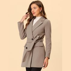 The long trench coat is shaped in a classic double-breasted cut. This soft, elegant coat with a tie around the waist detail is a classic look and will keep you warm in the cool weather. Whether you want to dress up your look or just stay warm in casual winter, it is a better choice for you. The self-tie belt style is flattering and fits more different body shapes. Belted Double-breasted Wool Coat For Business, Double-breasted Belted Wool Coat For Work, Elegant Pea Coat With Belted Cuffs And Long Sleeves, Belted Business Blazer For Winter, Elegant Pea Coat With Belted Cuffs, Office Lapel Collar Belted Outerwear, Elegant Long Sleeve Pea Coat With Belted Cuffs, Double-breasted Blazer With Belted Cuffs For Fall, Belted Notch Lapel Outerwear For Business Casual