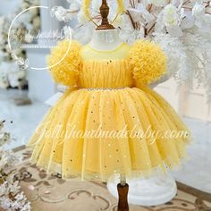 Welcome to our shop! We're delighted to have you here. Your satisfaction is our main goal, and we're happy to address any questions you may have about our products. Thank you for choosing us! ♥ Product Detail ♥ * Product Name: Yellow Tulle Dress * Product Type: Handmade * Product Material: Tulle, Satin, Cotton, Zipper. * Washable & Reusable * Stylish Short Sleeve Design * Soft and Comfortable to Wear ♥ Description ♥ Beautiful unique yellow dress, made out of bling tulle and lining. The simple st Yellow Tulle Formal Dress, Yellow Tulle Dress For Dress-up Occasions, Yellow Princess Dress For Dress-up, Gold Tulle Princess Dress For Baptism, Yellow Fitted Princess Dress For Dress-up, Fitted Yellow Princess Dress For Dress-up, Fitted Yellow Princess Dress For Party, Cute Yellow Tutu Dress For Party, Cute Yellow Tutu Dress For Dress-up