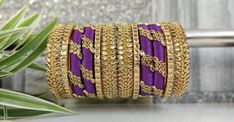 "Traditional Handmade Silk Thread Kundan Stone Studded Bangle Chuda Set Fashion Jewelry For Women Wedding Festive Party Wear Kada Set BANGLE SIZE -  2.4\" Inches, 2.6\" Inches, 2.8\" Inches, 2.10\" Inches Weight - 125 gm  Material: Silk Thread Color: As Per Picture The Bangles are decorated with beautiful stone. It makes your look noble and adds your charming Package include Set Of Silk Thread Bangles Fantastic Hand Kada for weddings, proms, parties or other special occasions * Specially Made For Traditional Occasions. * Used For Hands, It Can Be Reused. * For Bridal bridesmaids." Zari Work Bangle For Diwali Party, Diwali Party Bangle With Zari Work, Zari Work Bracelets For Diwali Party, Bollywood Style Bracelets With Zari Work For Parties, Bollywood Zari Work Bracelets For Party, Diwali Party Bracelets With Zari Work, Festive Party Bangle With Zari Work, Party Bangle With Gota Work, Festive Purple Bangle