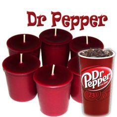 several red candles are in front of a dr pepper cup with the words dr pepper on it