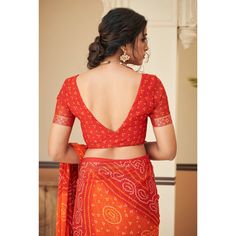 Red & Orange colored saree is made from chiffon fabric which is highlighted with beautiful printed with lace border & tassles as shown. Comes along with unstitched chiffon blouse piece which you can customise as per your design/style. Occasion - You can wear this saree for festive and functions. Note:- the actual product may differ slightly in color and design from the one illustrated in the images when compared with computer or mobile screen. Measurements: Saree : Chiffon : 5.5 Mtrs Blouse : Chiffon : 0.8 Mtr Material: Chiffon Stitch Type: Unstitched Country of Origin: India Care Guide: Dry Clean Bandhani Saree Blouse Design, Red Chiffon Saree, Saree With Lace Border, Printed Chiffon Saree, Saree Chiffon, Fearless Quotes, Blouse Chiffon, Orange Saree, Red Chiffon